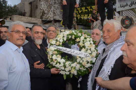المخيمات الفلسطينية في لبنان تجدّد العهد مع "أبو عمار": إرث الثورة باقٍ في الوجدان